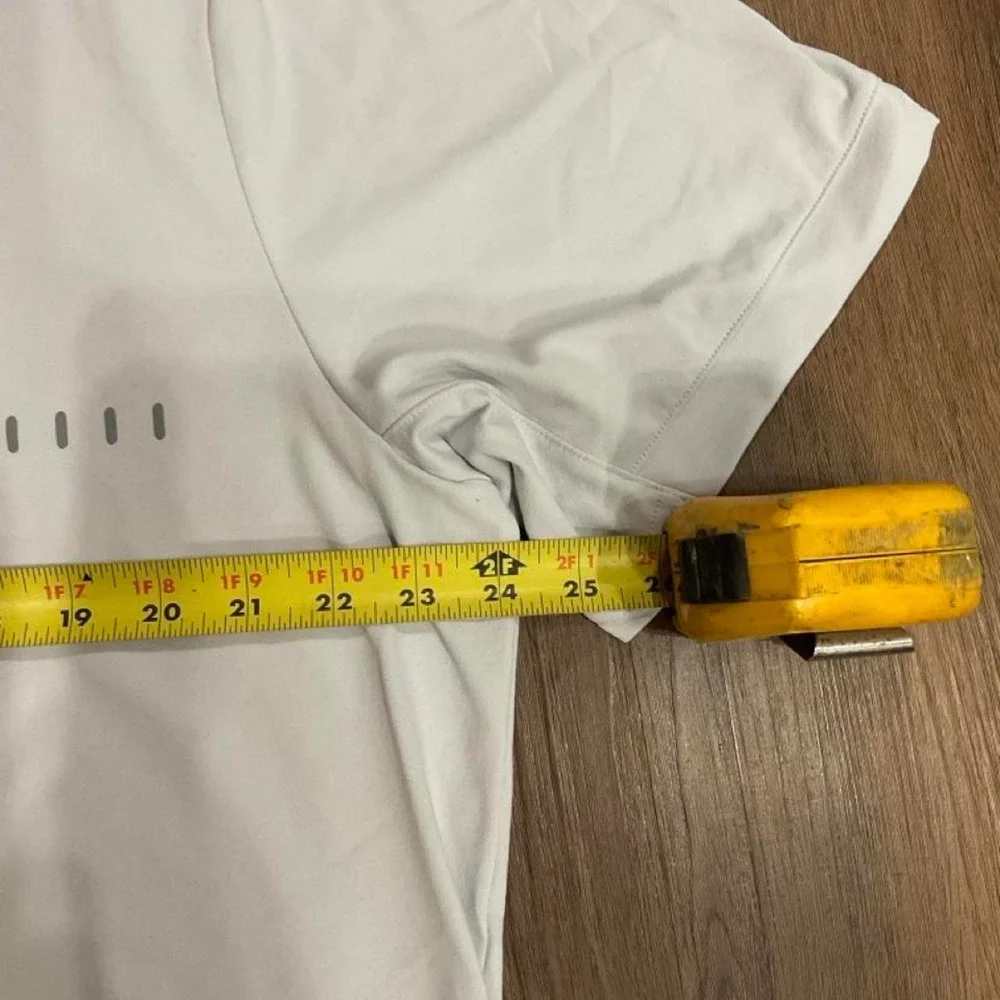 Under Armour white polo shirt